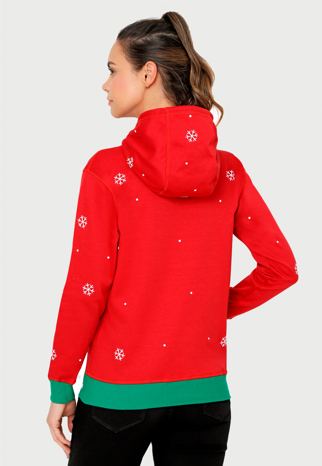 Mujer de Espalda luciendo lindo buzo de navidad con copos de nieve