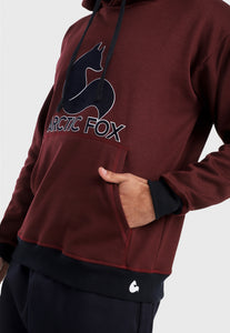 Detalle en bolsillos de hombre vistiendo el buzo hoodie vinotinto para hombre Arctic Fox con capota forrada azul.